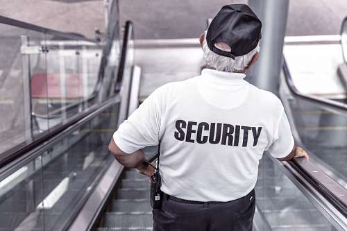 escalera mecanica Guardia de Seguridad