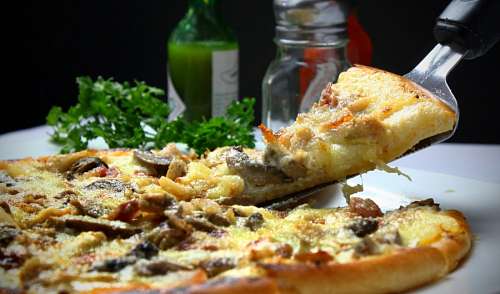 porcion Pizza de hongos