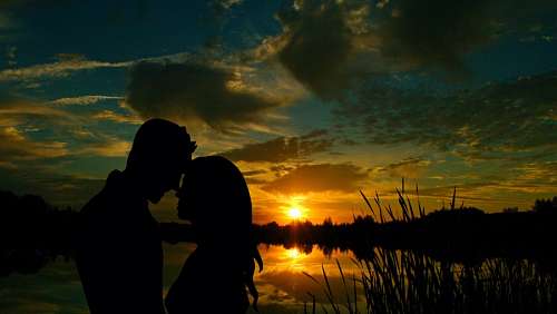 dos personas Pareja al atardecer