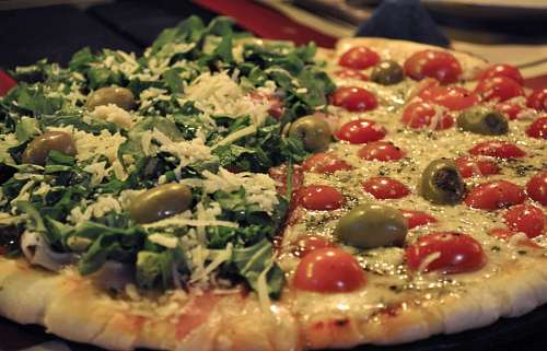 pizzara Pizza de Rucula y Tomates Cherry
