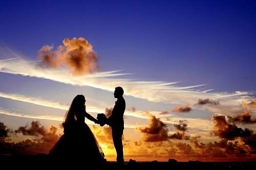 asado Recien casados bajo el atardecer