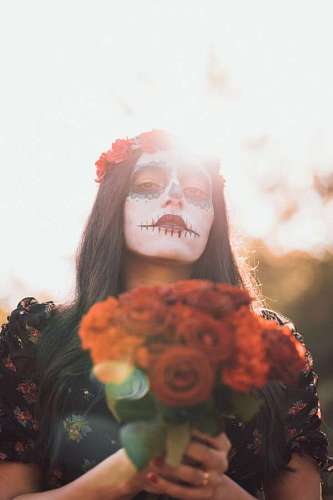 mexico Mujer con la cara pintada en el dia los muertos